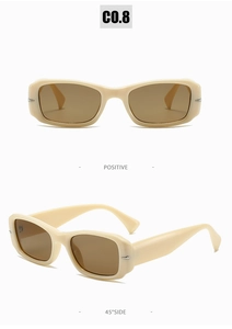 Detail view showing retro cream square frame sunglasses with brown lenses and metal accents
