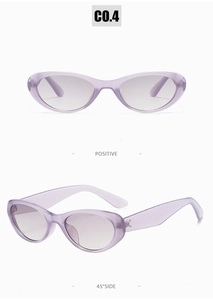 Détail de lunettes de soleil œil-de-chat lavande avec verres dégradés et clous argentés