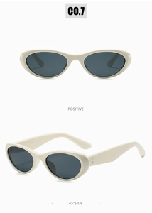 Vues de face et de profil de lunettes de soleil ovales crème avec larges branches chic