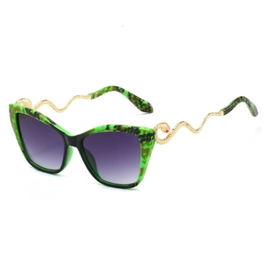 Retro cat-eye sunglasses with green tortoiseshell frames and golden snake-shaped temples