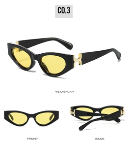 Detailed views of cat eye sunglasses with yellow lenses and golden H-shaped hinges