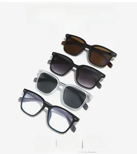 Detail shot of square sunglasses collection featuring wood-grain temples and rivet accents