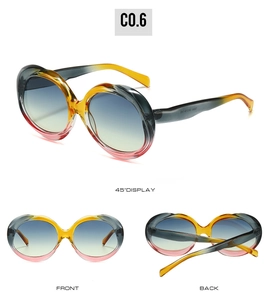 Vue détaillée de lunettes de soleil ovales avec dégradé de jaune et de rose