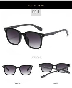 Detail view of square sunglasses with faux wood grain temples and gradient lenses