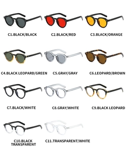 Collection of vintage oval sunglasses with PC frames and metal rivet accents in various colors