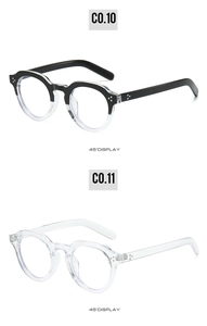 45-degree angle detail of retro oval PC sunglasses frames with metallic rivet accents