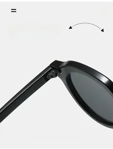 Macro detail of durable metal hinges on oval vintage sunglasses with high-quality finish