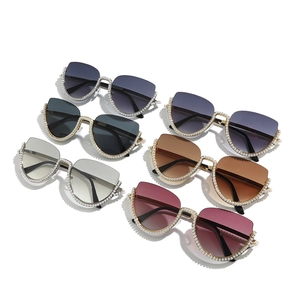 Cat eye half-frame sunglasses with pearls and metal temples in six various lens colors