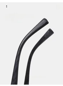 Detail view of square sunglasses featuring anti-slip wood grain texture on curved temple tips