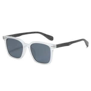Square fashion sunglasses with translucent frames and dark wood grain textured temples