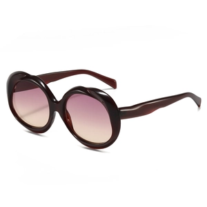 Lunettes de soleil ovales avec monture ondulée et verres dégradés violets