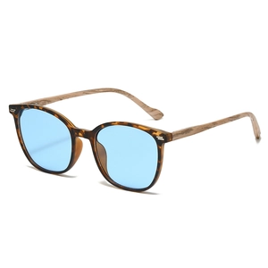 Retro tortoise shell sunglasses with blue lenses and wood grain temples for men and women