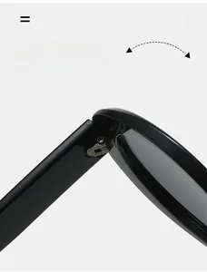 Detail of durable metal hinge on black thick-frame sunglasses showing folding mechanism