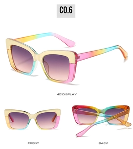 Vue détaillée des lunettes de soleil œil de chat arc-en-ciel avec verres dégradés violets