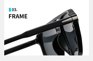 Close-up detail of glossy black sunglass frame with silver arrow metal hinge accents