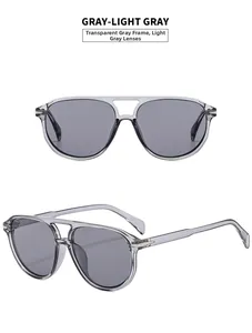 Transparent gray frame pilot sunglasses with light gray lenses in a minimalist double-bridge style