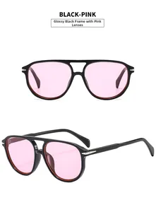 Detail view of large pilot sunglasses featuring black double-bridge frames and pink lenses