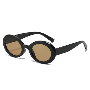 Retro oval black thick frame sunglasses with brown lenses shown from a 45-degree angle