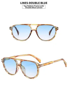 Detail of vintage double-bridge sunglasses with tortoise frames and blue gradient lenses