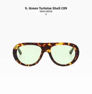 Detail view of oval demi green frame sunglasses with retro tortoiseshell texture