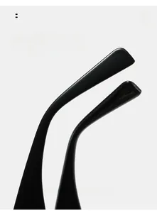 Close-up of curved black temple arms on Y2K sunglasses for comfortable fit