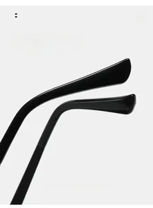 Detail view of glossy black curved sunglass arms designed for a comfortable arc fit
