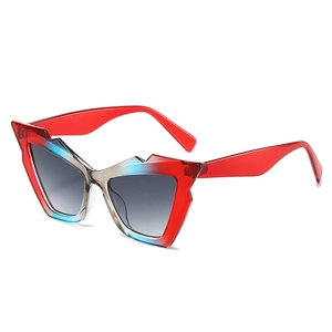 Futuristic geometric cat eye sunglasses with translucent red blue gray gradient frames