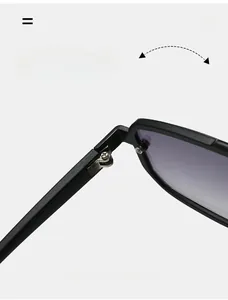 Detail shot of durable metal hinge on matte black double-bridge sunglasses for unisex