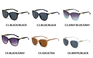 Cat eye sunglasses assortment in six colors with decorative gold spiral metal temples