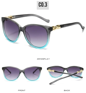 Detailed views of gradient sunglasses with twisted gold hinges and tinted lenses