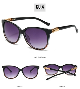 Detailed views of cat-eye sunglasses with purple gradient lenses and gold twisted accents
