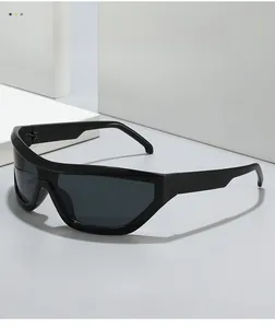 Close-up of Y2K hip-hop sunglasses featuring thick black frames and textured material