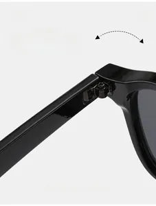 Detail of durable texture hinge construction on black trendy rectangular sunglasses