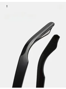 Detail of curved ergonomic temple legs for black sunglasses with anti-slip texture