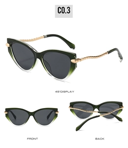 Cat eye sunglasses detail with gradient frame and wavy golden metal temples