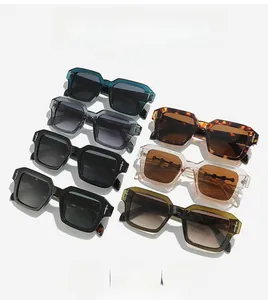 Stack of vintage square sunglasses in multiple colors featuring metal cross temple details