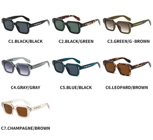 Detail view of square punk sunglasses featuring cross metal ornaments in seven color variants