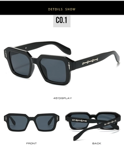 Detailed close-up of retro square sunglasses with silver dagger hinges and metal accents