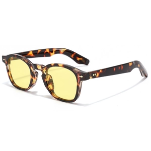 Vintage tortoiseshell sunglasses with yellow lenses and star rivets in a 45-degree view