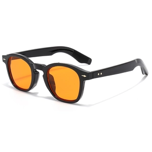 Retro black frame sunglasses with amber lenses and metallic details in a 45-degree view