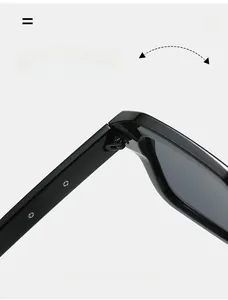 Macro detail of a durable metal hinge on black square fashion sunglasses with screws