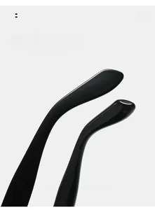 Detail of ergonomic curved black sunglasses legs designed for comfortable wearing