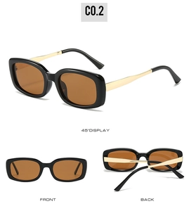 Detail view of rectangular sunglasses with black frames and gold metal temples