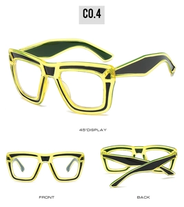 Three-angle view showing front and back of two-tone yellow and black vintage eyewear frames