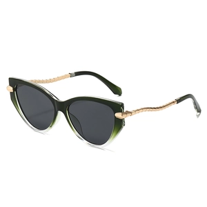 Cat eye sunglasses for women with green gradient frames and wavy gold metal temples