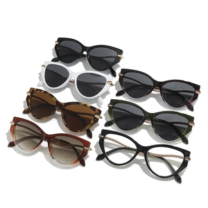 Chic cat eye sunglasses set in multiple colors with metallic chain accents for women