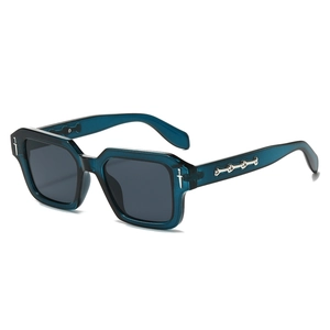 2024 square sunglasses with turquoise frame and silver bone detail at 45-degree angle