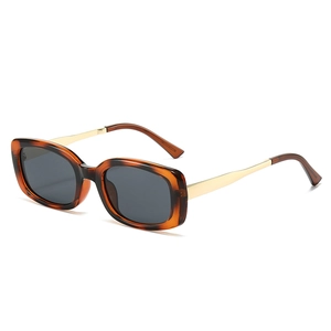 Retro rectangular tortoiseshell sunglasses with gold metal temples in a 45-degree view
