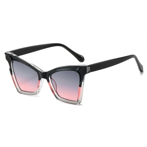 Lunettes de soleil œil de chat chic avec monture bicolore noir et transparent et verres dégradés