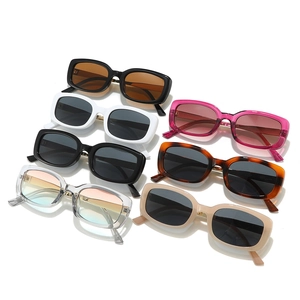 Retro rectangular sunglasses in multiple colors including black, pink and tortoiseshell